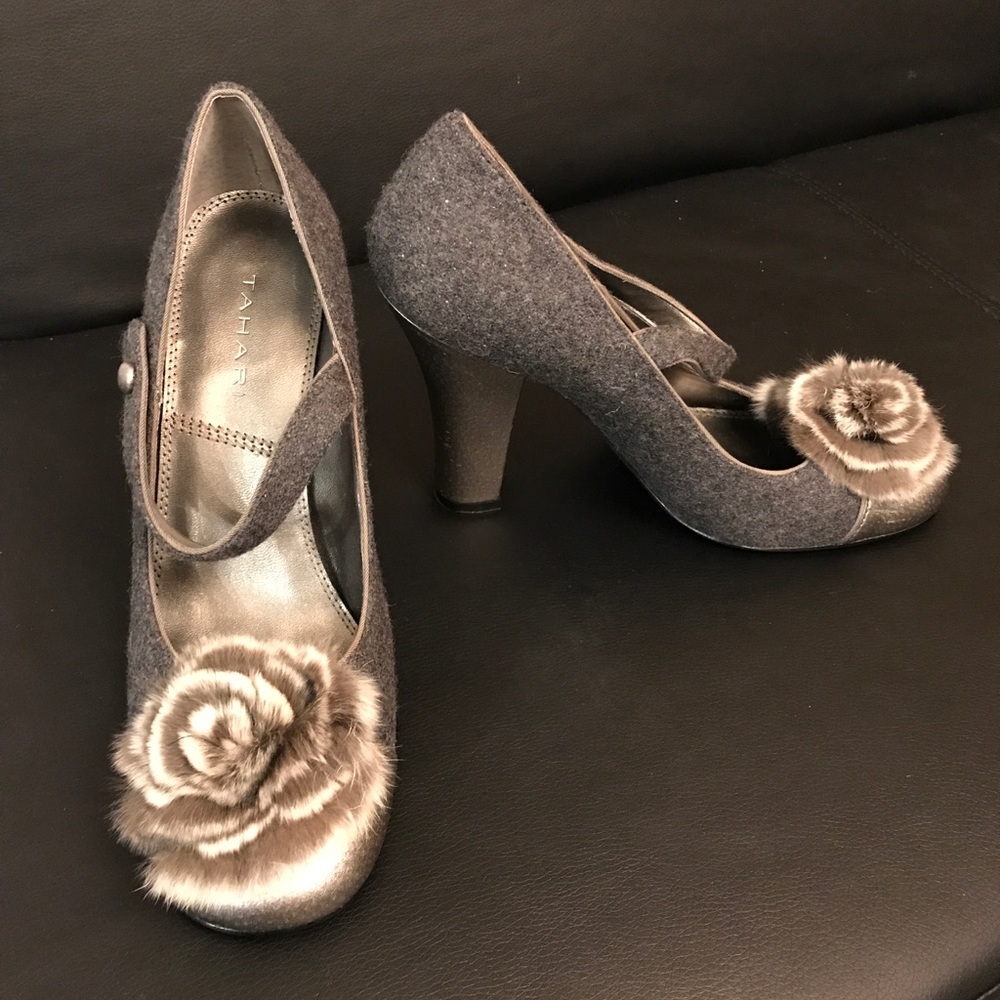 Tahari gray pumps with flower embellishment.